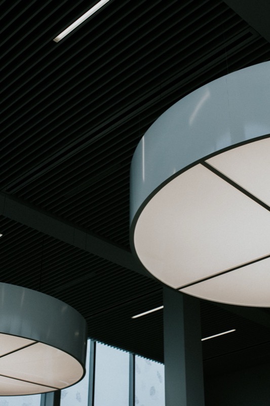 Rows of ceiling lights in an office