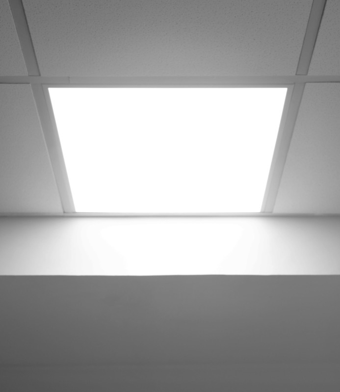 A square LED panel set into a ceiling